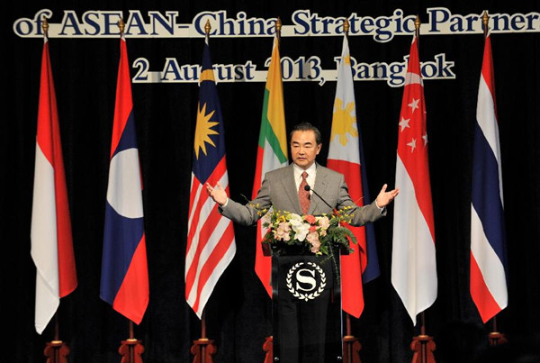Chinese Foreign Minister Wang Yi addresses the opening ceremony of the High-Level Forum on the 10th Anniversary of China-ASEAN Strategic Partnership held in Bangkok, Thailand, on Aug. 2, 2013. Wang Yi on Friday called on ASEAN countries to join hands with China to further deepen and enrich their cooperation following 10 years of strategic partnership. (Xinhua/Gao Jianjun)
