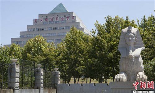 A replica of Egypts Sphinx stands in front of the campus library intended to resemble an Egyptian pyramid at Wuhan International Trade University. Photo: chinanews.com