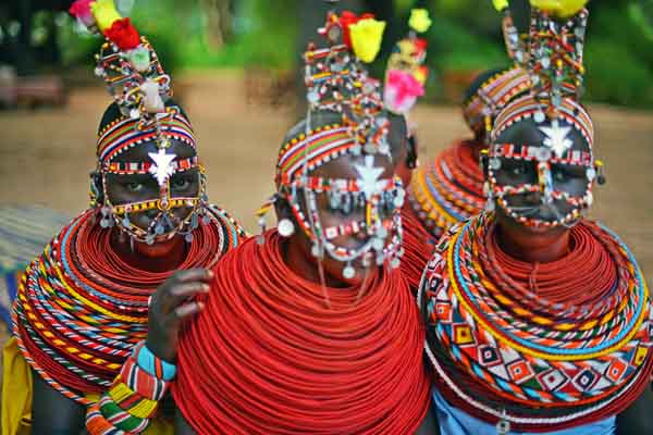Samburu women look on in the Samburu game reserve in May. United Nations Environment Programme goodwill ambassador and Chinese actress Li Bingbing was on an official visit to the Samburu reserve in Kenya to highlight issues of Africa's poaching crisis. Carl de Souza / Agence France-Presse