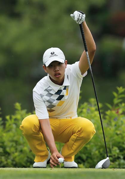 Fourteen-year-old Guan Tianlang is the youngest player in history to play in a Masters Tournament. Scott Halleran / Agence France-Presse