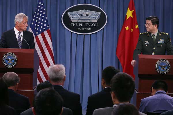 US Defense Secretary Chuck Hagel and Chinese Minister of National Defense Chang Wanquan speak Monday at a news conference at the Pentagon in Arlington, Virginia. They spoke about regional issues and US-China relations. Mark Wilson/Getty Images/AFP