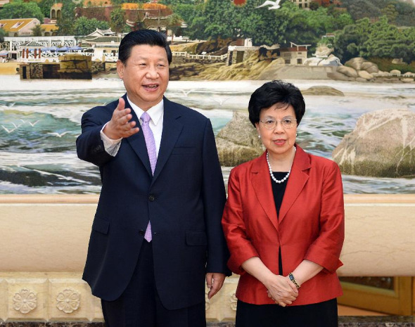 Chinese President Xi Jinping (L) meets with the World Health Organization (WHO) chief Margaret Chan Fung Fu-chun, at the Great Hall of the People in Beijing, capital of China, Aug. 20, 2013. (Xinhua/Li Tao