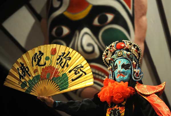 A demonstration of face-changing skills during a Sichuan opera performance at the Temple of the Marquis of Wu in Chengdu. Performers change one mask to another in the blink of an eye, using secret techniques known only to themselves. Xue Yubin / Xinhua