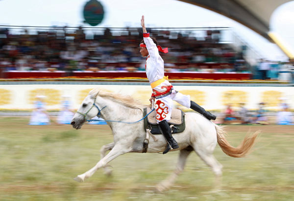 A man displays his skill on horseback at a recent Nadaam held in Xilinhot in the Inner Mongolia autonomous region.