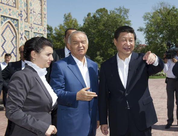 Chinese President Xi Jinping (R, front) visits the ancient Ulugh Beg Observatory with the company of Uzbekistan's President Islam Karimov (C) in Samarkand, Uzbekistan, Sept. 10, 2013. (Xinhua/Huang Jingwen)