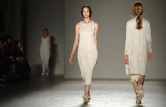 A model presents a creation for fashion house Uma Wang as part of the spring/summer 2014 ready-to-wear collections during the fashion week  in Milan on September 23, 2013.