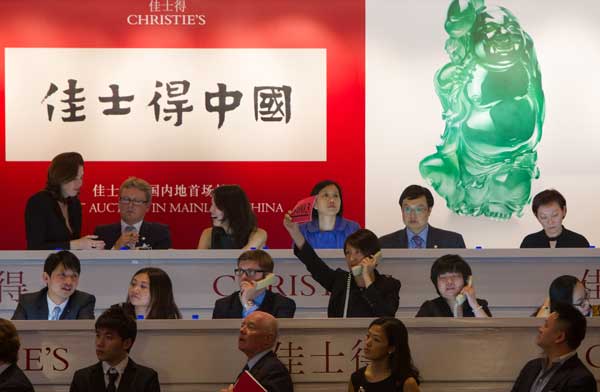 Christie's holds its first auction on the mainland on Thursday. The company received its license to operate on the mainland in April. Gao Erqiang / China Daily