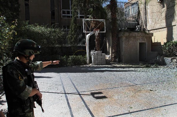Damages are seen inside the Chinese Embassy to Syria in the neighborhood of al-Malki in Damascus, capital of Syria, on Sept. 30, 2013. A mortar shell on Monday fell into the compound of the Chinese embassy in Damascus, slightly injuring a Syrian employee, according to a source from the embassy. (Xinhua/Bassem Tellawi)