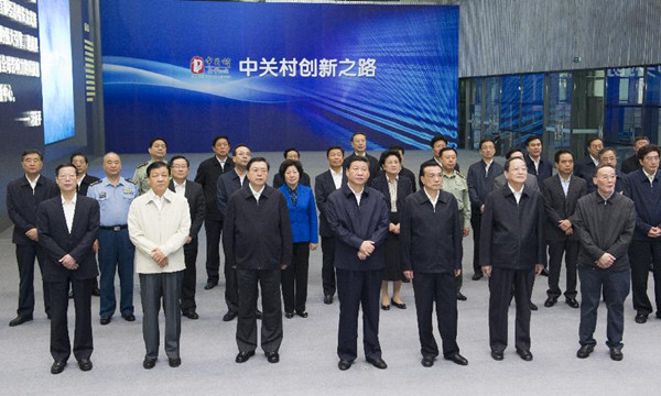China's top leaders Xi Jinping (C, front), Li Keqiang (3rd R, front), Zhang Dejiang (3rd L, front), Yu Zhengsheng (2nd R, front), Liu Yunshan (2nd L, front), Wang Qishan (1st R, front), Zhang Gaoli (1st L, front) and other members of the Political Bureau of the Communist Party of China (CPC) Central Committee visit the Zhongguancun Science Park in Beijing, capital of China, Sept. 30, 2013. China's top leadership held a group study Monday in Zhongguancun, a Beijing technology hub known as China's Silicon Valley. (Xinhua/Huang Jingwen)