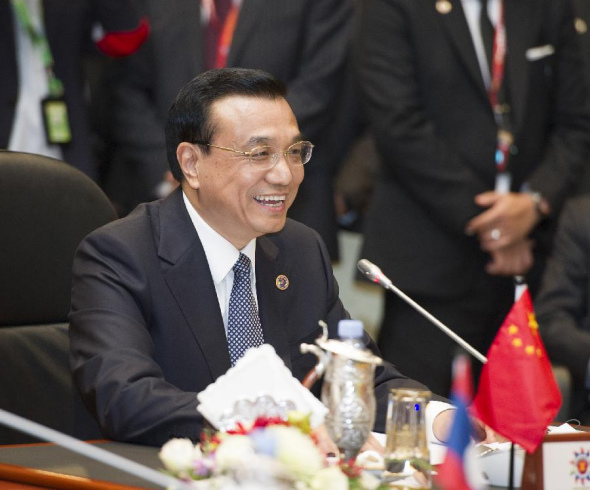Chinese Premier Li Keqiang attends the 16th China-ASEAN leaders' meeting in Bandar Seri Begawan, Brunei, Oct. 9, 2013. (Xinhua/Huang Jingwen)