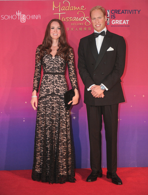 Wax statues of Prince William and the Duchess of Cambridge Kate Middleton, the prince's wife.[Photo provided to chinadaily.com.cn]