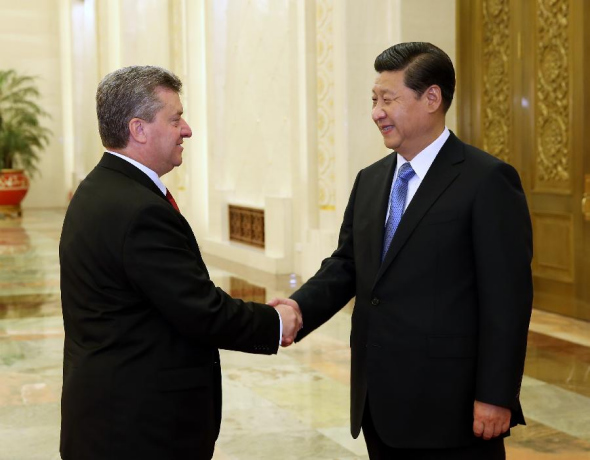 Chinese President Xi Jinping(R) meets with President of Macedonia Gjorge Ivanov in Beijing, capital of China, Oct. 21, 2013. The Macedonian president is in China to attend the 14th Western China International Fair (WCIF), to be held in Chengdu of southwest China's Sichuan Province from Oct. 23 to 27. (Xinhua/Pang Xinglei)