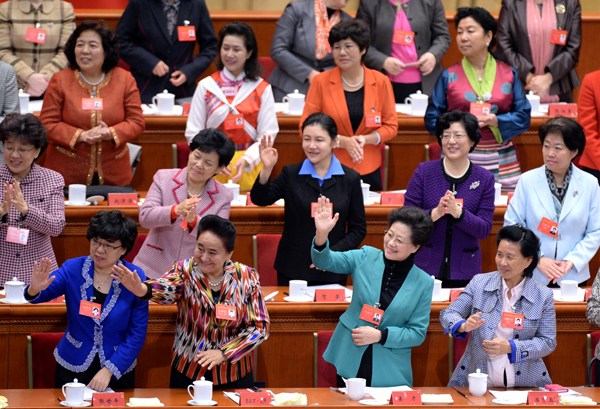 Delegates from around China attend the opening ceremony of the 11th National Women's Congress in Beijing on Monday. The congress is expected to draw up a blueprint for the economic advancement of Chinese women in the next five years. Liao Pan / For China Daily