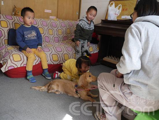 Therapy dog Nella with kids in Rehabilitation Center for Hearing Impaired Children in Haidian District