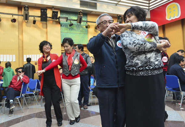 More than 100 people, many aged 60 or older, take part in a matchmaking party in Beijing in autumn 2012. Xinhua