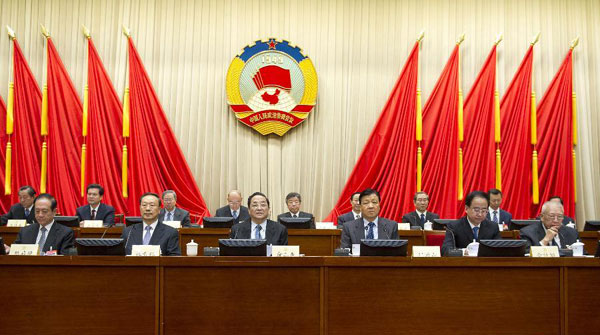Yu Zhengsheng (3rd L, front), member of the Standing Committee of the Political Bureau of the Communist Party of China (CPC) Central Committee and chairman of the National Committee of Chinese People's Political Consultative Conference (CPPCC), and Liu Yunshan (3rd R, front), also member of the Standing Committee of the Political Bureau of the CPC Central Committee and secretary of the Secretariat of the CPC Central Committee, attend the third session of the Standing Committee of the 12th National Committee of CPPCC, in Beijing, capital of China, Nov. 18, 2013. [Photo/Xinhua] 