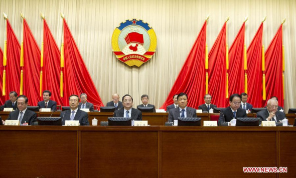 Yu Zhengsheng (3rd L, front), member of the Standing Committee of the Political Bureau of the Communist Party of China (CPC) Central Committee and chairman of the National Committee of Chinese People's Political Consultative Conference (CPPCC), and Liu Yunshan (3rd R, front), also member of the Standing Committee of the Political Bureau of the CPC Central Committee and secretary of the Secretariat of the CPC Central Committee, attend the third session of the Standing Committee of the 12th National Committee of CPPCC, in Beijing, capital of China, Nov. 18, 2013. (Xinhua/Xie Huanchi) 