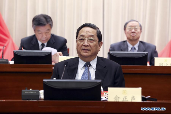 Yu Zhengsheng, a member of the Standing Committee of the Political Bureau of the Communist Party of China (CPC) Central Committee and chairman of the National Committee of Chinese People's Political Consultative Conference (CPPCC), attends the third session of the Standing Committee of the 12th National Committee of CPPCC, in Beijing, capital of China, Nov. 19, 2013. (Xinhua/Ding Lin) 