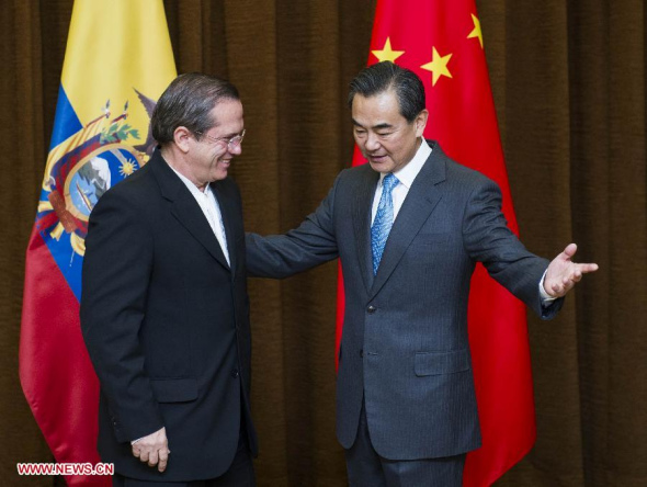 Chinese Foreign Minister Wang Yi (R) meets with his Ecuadorian counterpart Ricardo Patino during the 7th political consultations between the two foreign ministries in Beijing, capital of China, Nov. 20, 2013. (Xinhua/Wang Ye)