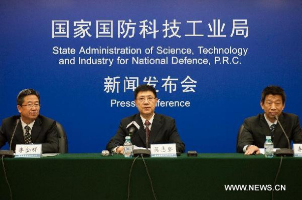 Wu Zhijian (C), spokesman with the State Administration of Science, Technology and Industry for National Defense, introduces China's lunar probe at a press conference in Beijing, capital of China, Nov. 26, 2013. China is scheduled to launch Chang'e-3 lunar probe to the moon in early December, marking the first time for a Chinese spacecraft to soft-land on the surface of an extraterrestrial body, the official said Tuesday. (Xinhua/Liu Jinhai)