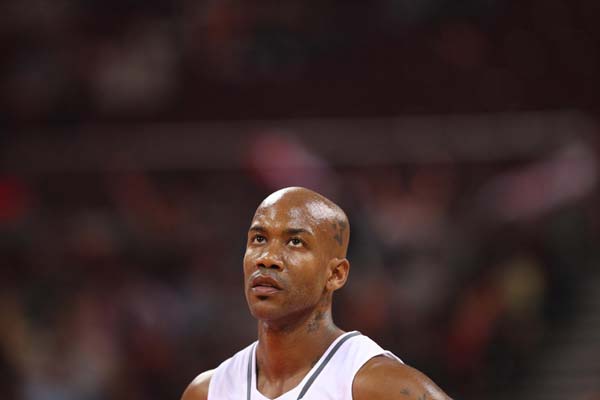 Beijing Ducks' Stephon Marbury reacts during a CBA league game, Oct 11 file photo. [Photo/Xinhua]
