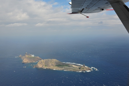 EXERCISING SOVEREIGNTY: A photo taken from a marine surveillance plane on December 13, 2012 shows the Diaoyu and nearby islands. A Chinese aircraft was sent to join vessels patrolling territorial waters in the area (XINHUA)