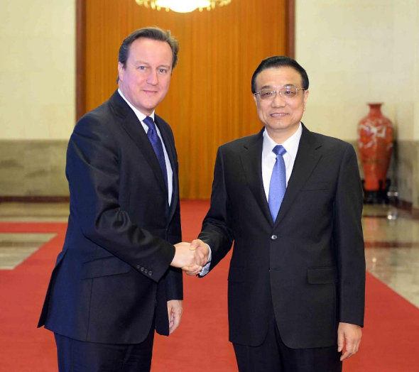 Chinese Premier Li Keqiang (R) holds a welcoming ceremony for the visiting British Prime Minister David Cameron in Beijing, capital of China, Dec. 2, 2013.(Xinhua/Li Tao)
