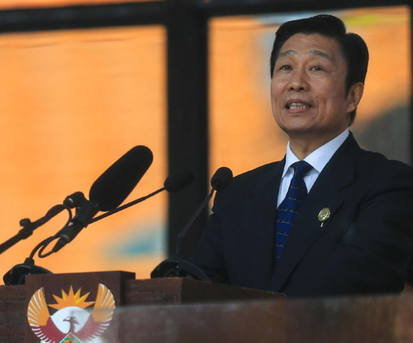 Chinese Vice President Li Yuanchao, the special representative of Chinese President Xi Jinping, delivers a speech during the memorial service for Nelson Mandela in Johannesburg, South Africa, on Dec 10, 2013. Li Yuanchao on Tuesday expressed deep condolences and paid high tribute to former South African President Nelson Mandela, saying Chinese will always cherish Mandela's contribution to China-South Africa relations. (Xinhua/Meng Chenguang)