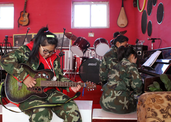 Educators use music to help children kick their addiction to the Internet at Beijing Qide Education Center. China has 24 million Internet addicts, and most are aged between 12 and 18. Zou Hong / China Daily