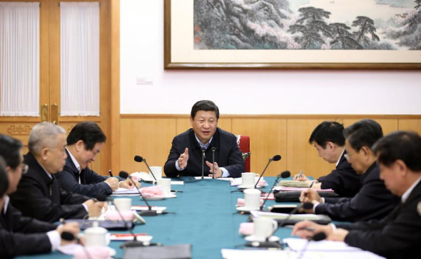 Chinese President Xi Jinping, also general secretary of the Communist Party of China (CPC) Central Committee, attends a meeting as part of the ongoing mass line campaign with members of the Party Committee of north China's Hebei Province, in Beijing, capital of China, Dec. 9, 2013.(Xinhua/Lan Hongguang) 