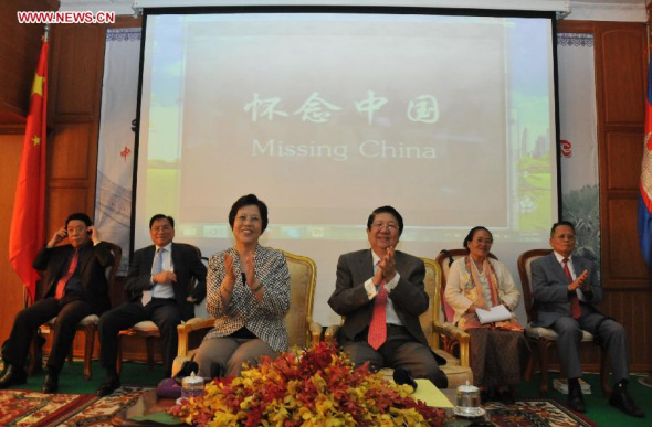 Cambodian Deputy Prime Minister and Cabinet Minister Sok An (R, Front) and Chinese Ambassador to Cambodia Bu Jianguo (L, Front) attend the 3rd conference on the 55th anniversary of the Cambodia-China diplomatic relations in Phnom Penh, Cambodia, Dec 23, 2013. The 3rd conference on the 55th anniversary of the Cambodia-China diplomatic relations was called here on Monday, aiming at broadening traditional and friendly ties between the two countries. The one-day forum, organized by the Confucius Institute at the Royal Academy of Cambodia, was attended by more than 200 people from various ministries in Cambodia. (Xinhua/Li Hong)