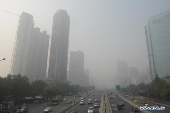 Buildings are enveloped in fog at the CBD area in Beijing, capital of China, Nov 2, 2013. (Xinhua/Luo Xiaoguang) 