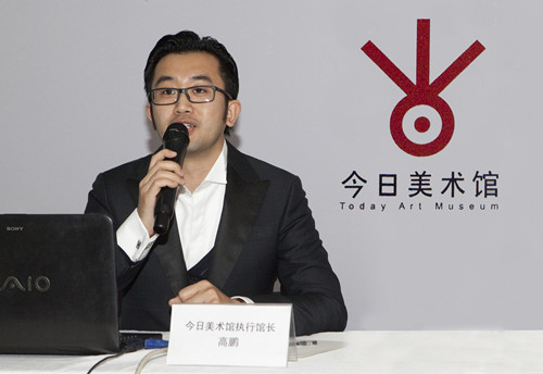 Alex Gao, executive director of Today Art Museum, outlines important exhibitions and events in 2014, at a press conference on Jan 12, 2014 in Beijing. [Photo provided for Ecns]