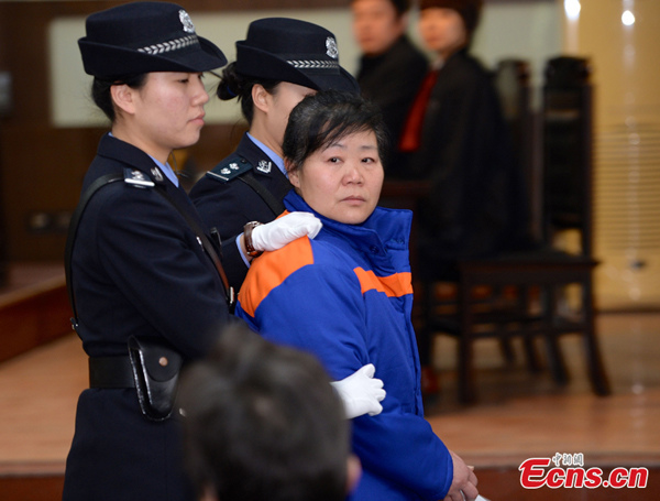 Zhang Shuxia is sentenced to death with a two years' reprieve on Tuesday for trafficking seven babies. (Photo: China News Service / Zhang Yuan)