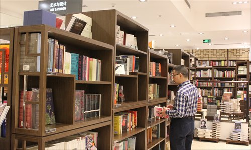 A customer in a Page One bookstore in Beijing on Wednesday Photo: Xiong Yuqing/GT