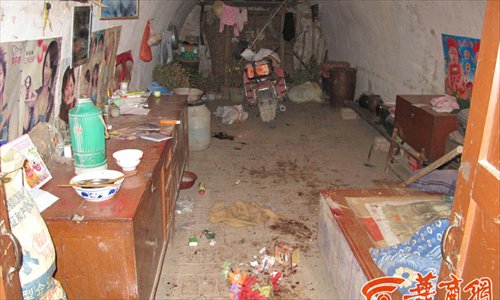 The scene left after a boar rampaged through the home of a family in Donghe village, Xianyang, Shaanxi province on January 12. Photo: hsw.cn