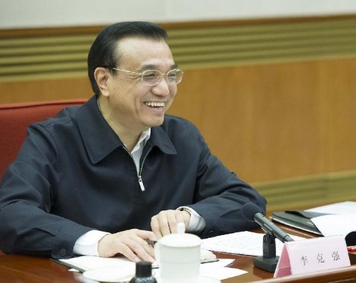 Chinese Premier Li Keqiang listens and comments on the opinions of scholars and businesspeople regarding the government's work in 2013, in Beijing, China, Jan. 17, 2014. (Xinhua/Huang Jingwen)
