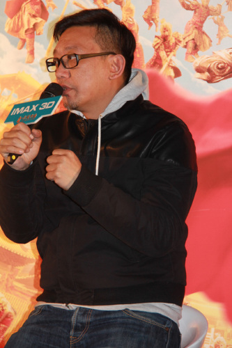 Film director Pou-Soi Cheang attends the premiere of IMAX 3D version of the Chinese film The Monkey King: Havoc in the Heavenly Palace in Beijing on Saturday on January 25th. [Photo: CRIENGLISH.com/Zhao Pingping]