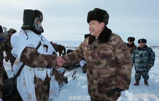 Chinese President Xi Jinping visits soldiers on Sanjiao Mountain in Arshaan city, Hinggan League, Inner Mongolia autonomous region, in temperatures of -30 C, on Jan 26, 2014. [Photo/PLA Daily]