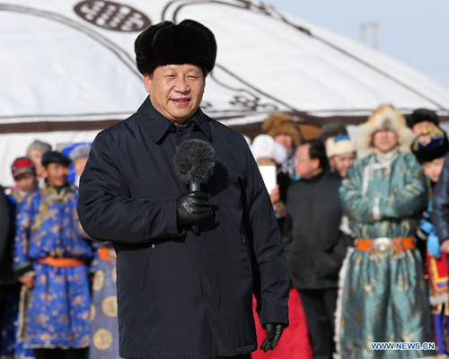 Chinese President Xi Jinping speaks at a winter Nadam Fair in Xilin Gol grassland, north China's Inner Mongolia Autonomous Region, ahead of the upcoming Chinese lunar new year. Xi paid a visit to Inner Mongolia recently and extended lunar new year greetings to people of all ethnic groups, compatriots from Hongkong, Macao and Taiwan, and all overseas Chinese. (Xinhua/Pang Xinglei)