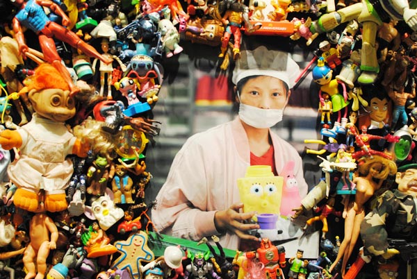 Portraits of workers who produce the toys are embedded in the installations on show. Wu Ni / China Daily