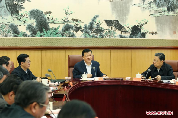 Liu Yunshan (2nd, R), a member of the Standing Committee of the Political Bureau of the Communist Party of China (CPC) Central Committee, presides over the 9th meeting of the leading group of the mass line education campaign, aimed to strengthen the ties between the CPC and the public, in Beijing on Feb 9. (Xinhua/Yao Dawei)