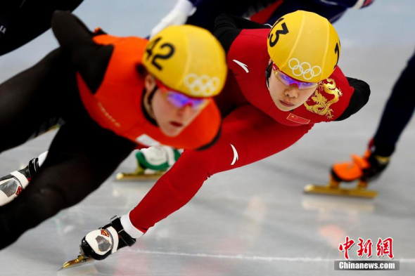 China's Zhou Yang takes a curve during a women's 1,500 metres short track speed skating heat event at the Iceberg Skating Palace during the 2014 Sochi Winter Olympics February 15, 2014. [Photo: Agencies]