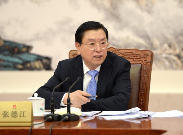 Zhang Dejiang, chairman of the Standing Committee of China's National People's Congress (NPC), presides over the 17th meeting of the Chairmen's Council of the 12th NPC Standing Committee at the Great Hall of the People in Beijing, capital of China, Feb 17, 2014. (Xinhua/Ma Zhancheng) 