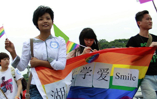 Over 100 people take part in a demonstration in Changsha, Hunan province, in May to call for an end to discrimination against gay people. The rally had not been registered with the police, and the organizer was detained for 12 days. Zhou Qiang / for China Daily 
