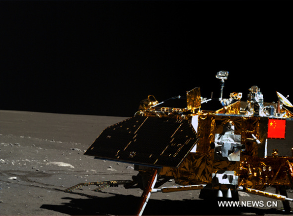 This undated photo taken by the camera on the Yutu moon rover shows the Chang'e-3 moon lander and the moon surface. The Chang'e-3 lander entered its third dormancy on early Feb 23, 2014. (Xinhua/SASTIND)