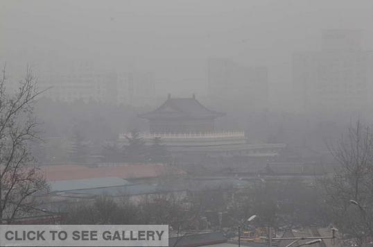 The photo taken on Thursday shows Beijing in the smog