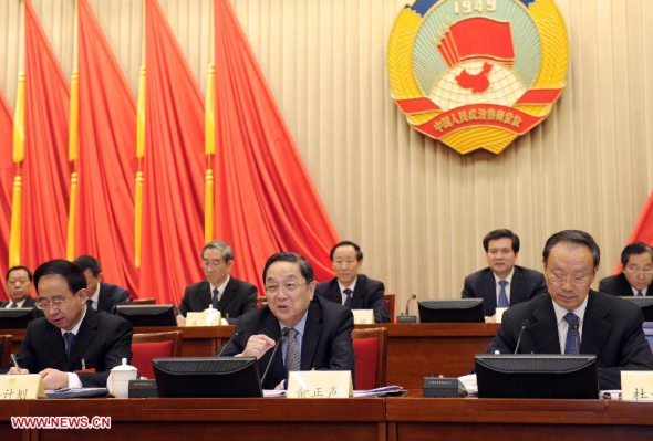 Yu Zhengsheng (C, front), chairman of the National Committee of the Chinese People's Political Consultative Conference (CPPCC), addresses a meeting of the fourth session of the Standing Committee of the 12th CPPCC National Committee in Beijing, capital of China, Feb. 28, 2014. The session was concluded here on Friday. (Xinhua/Zhang Duo)