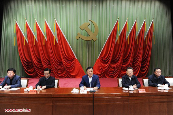 Liu Yunshan (C), president of the Party School of the Communist Party of China (CPC) Central Committee and a member of the Standing Committee of the Political Bureau of the CPC Central Committee, addresses the opening ceremony of the school's 2014 spring semester in Beijing, capital of China, March 1, 2014. (Xinhua/Rao Aimin)