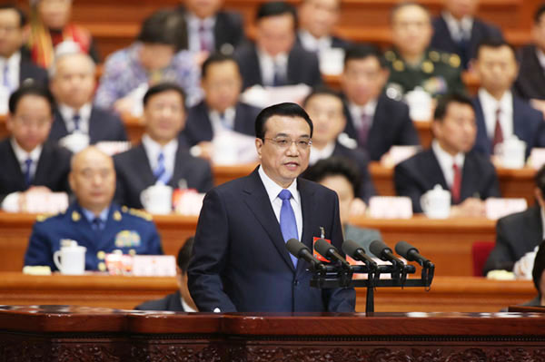 Premier Li Keqiang delivers government work report at the opening meeting of the National People's Congress, China's top legislative body in Beijing, March 5, 2014. [Photo by Wu Zhiyi/China Daily]